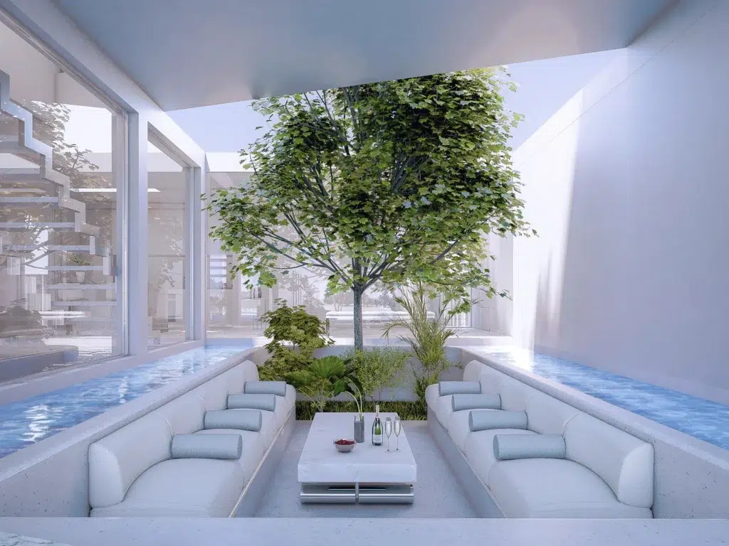 Minimalist courtyard with water features in a Spanish property, ideal for buyers considering buying property in Spain.
