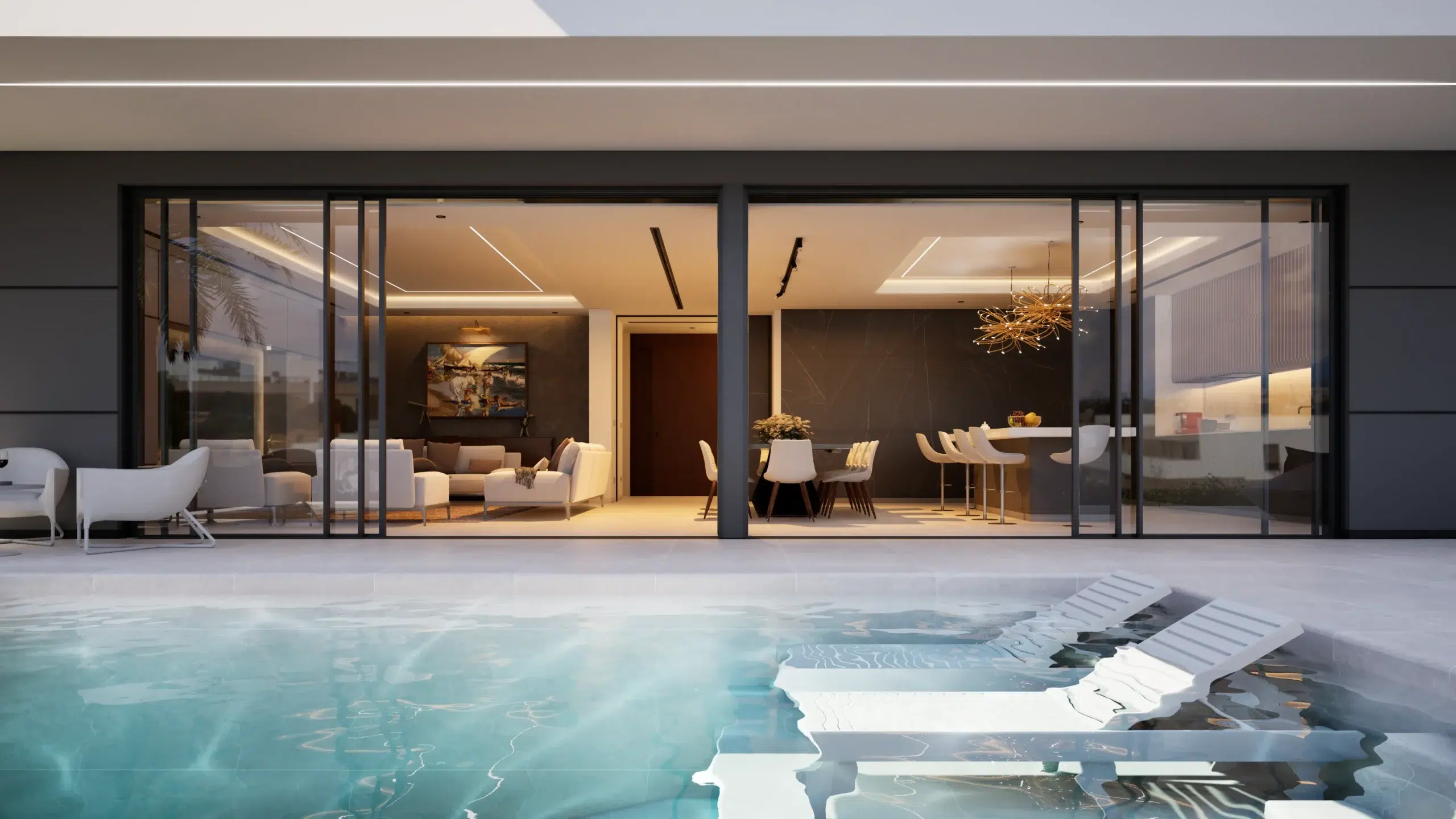Interior view of a luxury home in Alicante featuring an integrated pool, showcasing modern elegance and Mediterranean Modernism design