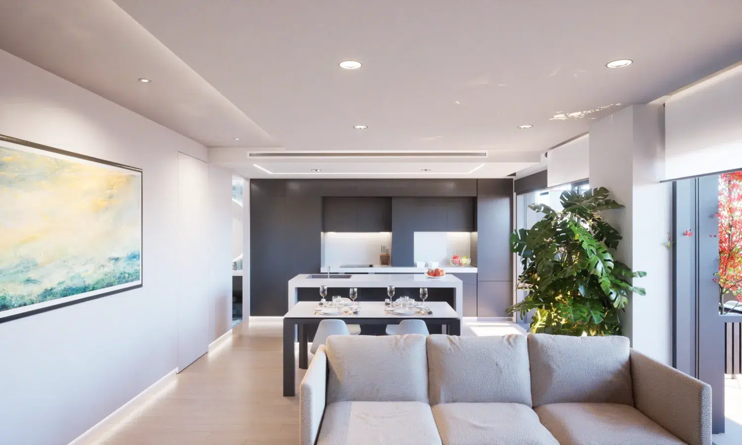 Living Spaces in Spain often feature enclosed kitchens, unlike Northern Europe, where open-plan designs are more common. This modern kitchen with a central island showcases a sleek and functional layout.