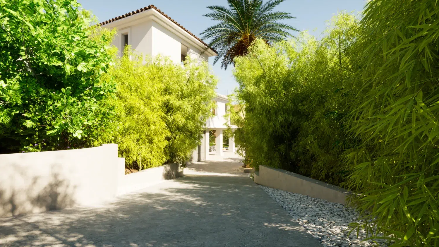 Spain legal guide for foreign residents: Understanding property ownership laws in Spain, featuring the entrance of a luxury villa with a private driveway and lush Mediterranean landscaping.