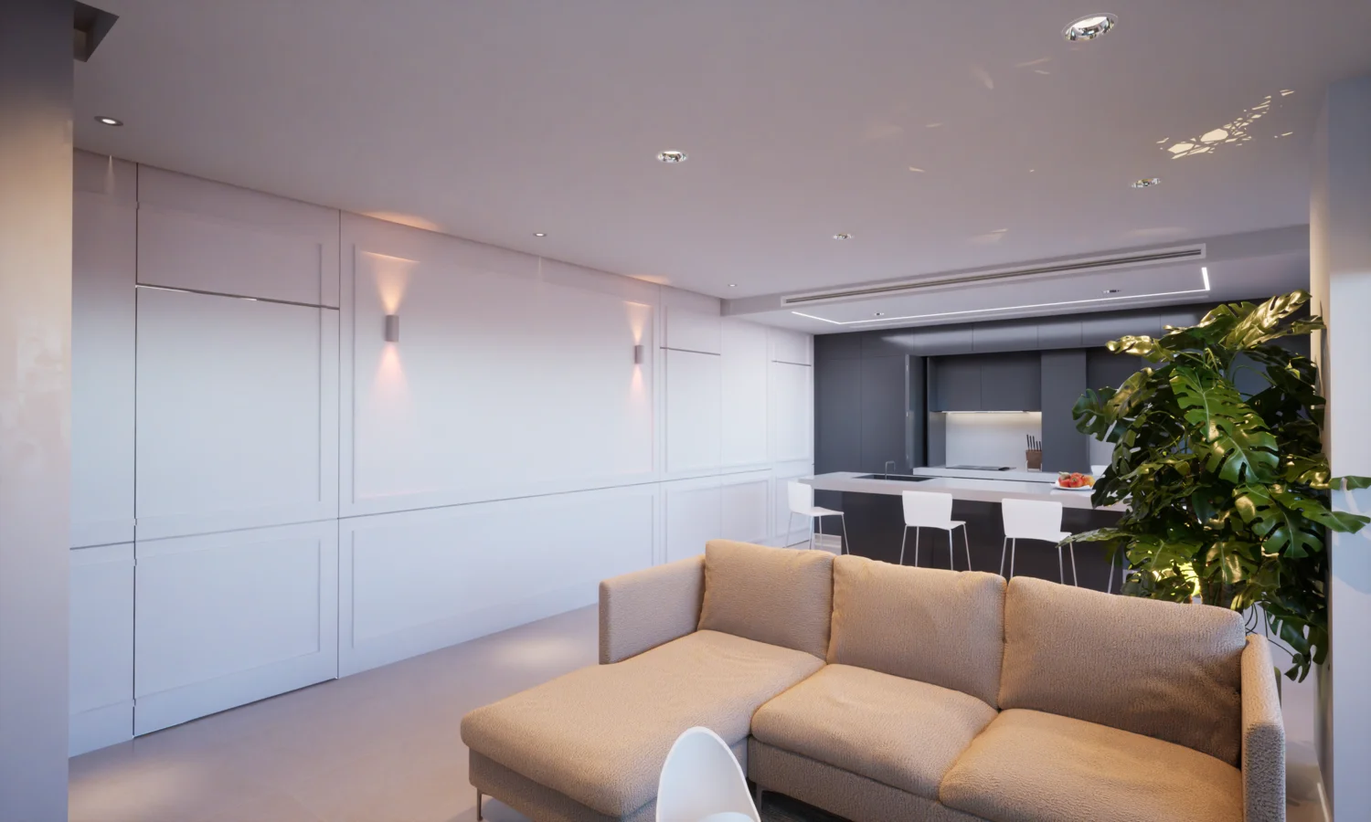 In Northern Europe, open-plan living spaces are the norm, whereas Living Spaces in Spain typically maintain more separation between rooms. This modern living area integrates the kitchen while preserving distinct zones.