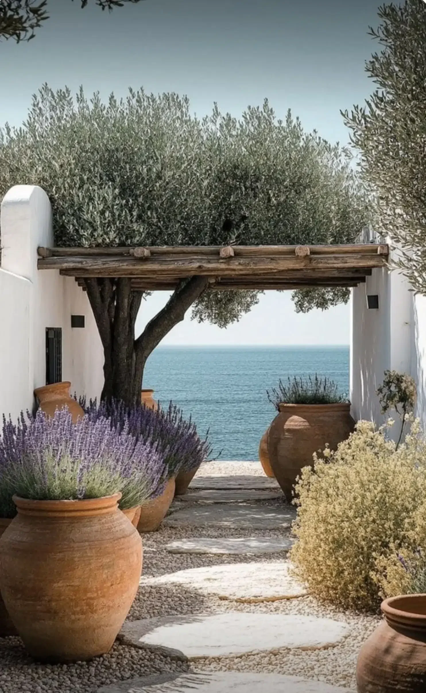 Mediterranean patio with lavender and sea view, part of a sensory residential architecture project