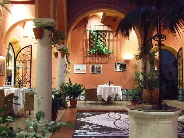 Historic homes restoration in Spain at Casa del Corregidor in Cádiz, featuring a traditional courtyard with columns. 