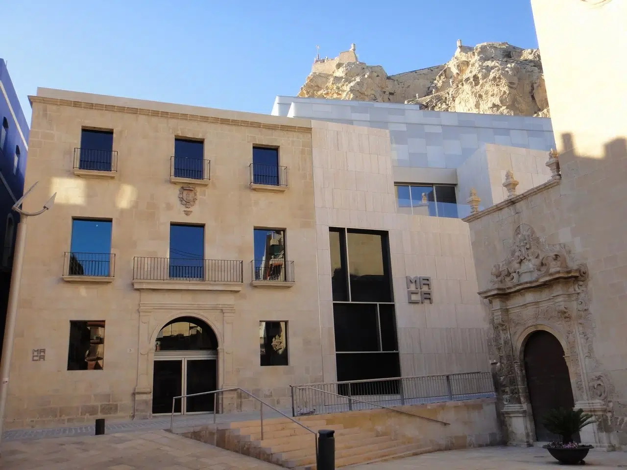 Facade reflecting traditional vs contemporary architectural dialogue
