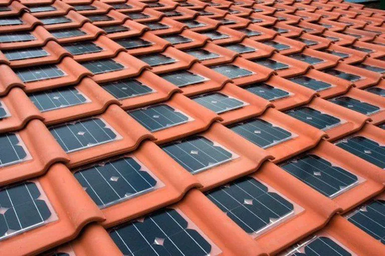 Integrated curved solar tile, an example of innovative materials in elite residential architecture