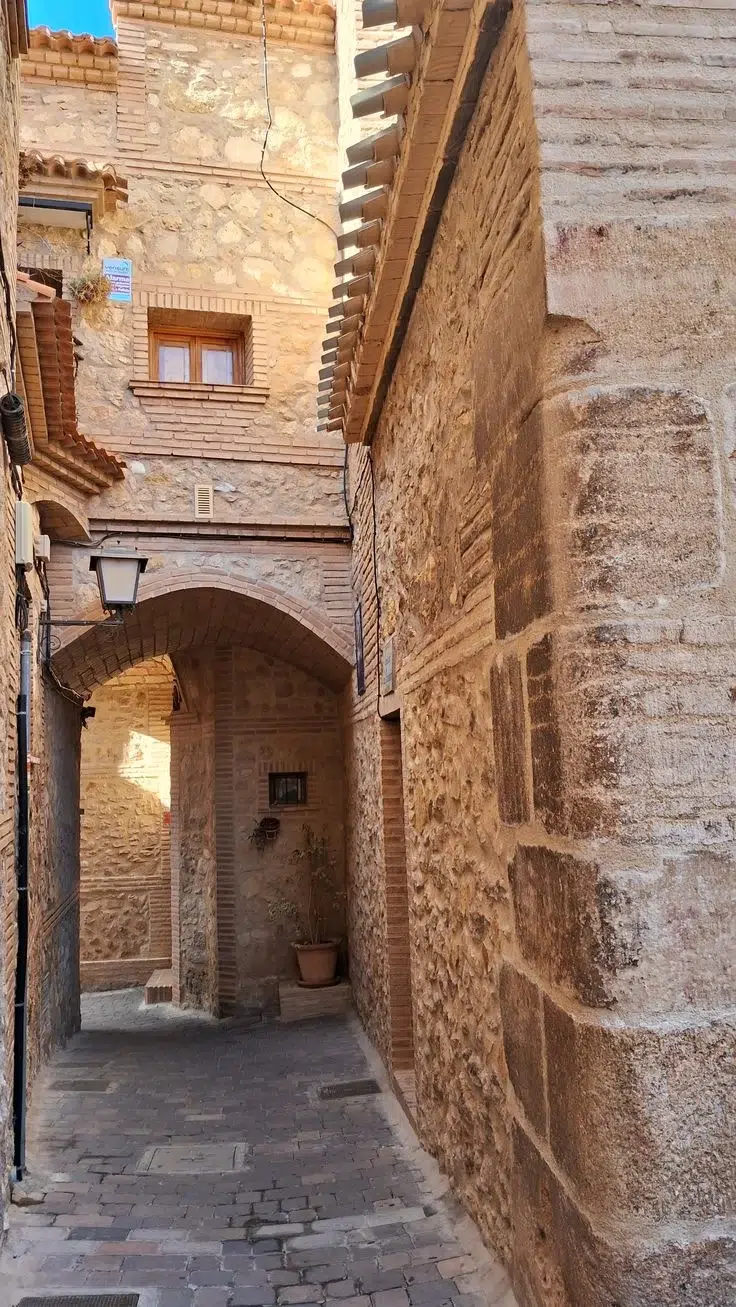 Cobbled street with traditional architecture in Pliego, example of the charm of Murcia's rural districts

