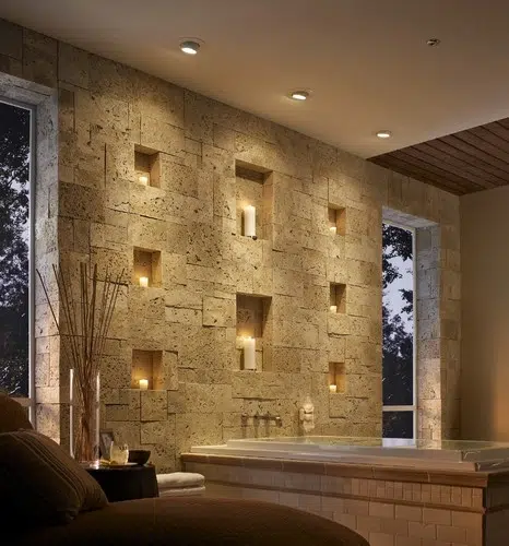 Living room with thick stone walls applying bioclimatic architecture