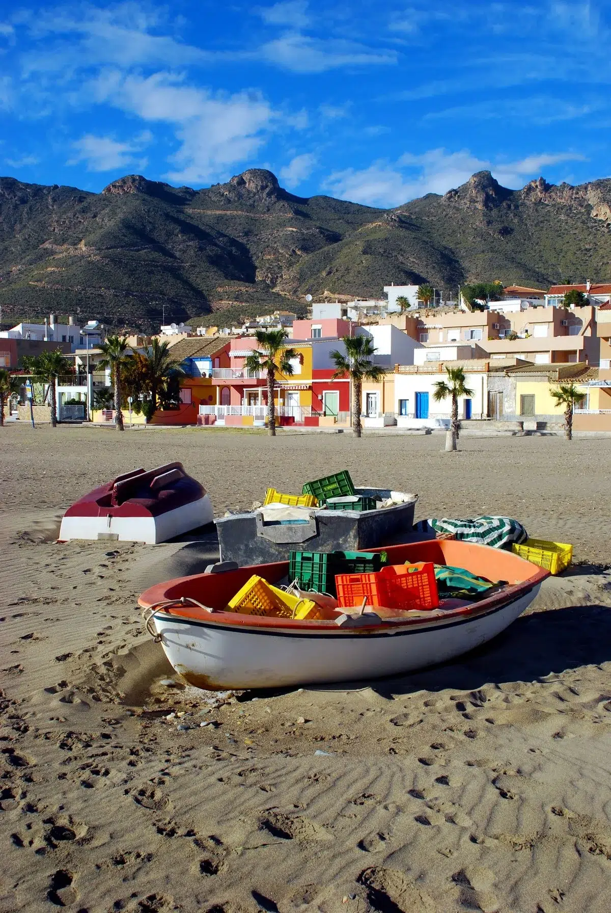 Fishing boats on Bolnuevo beach, near areas ideal for building in Murcia's rural districts
