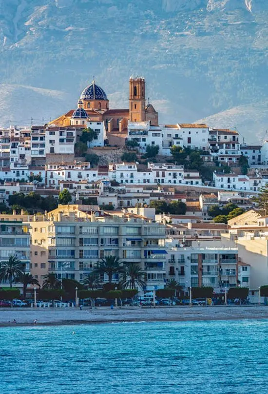 Panoramic view of Altea's old town with traditional architecture showing how to save on construction.