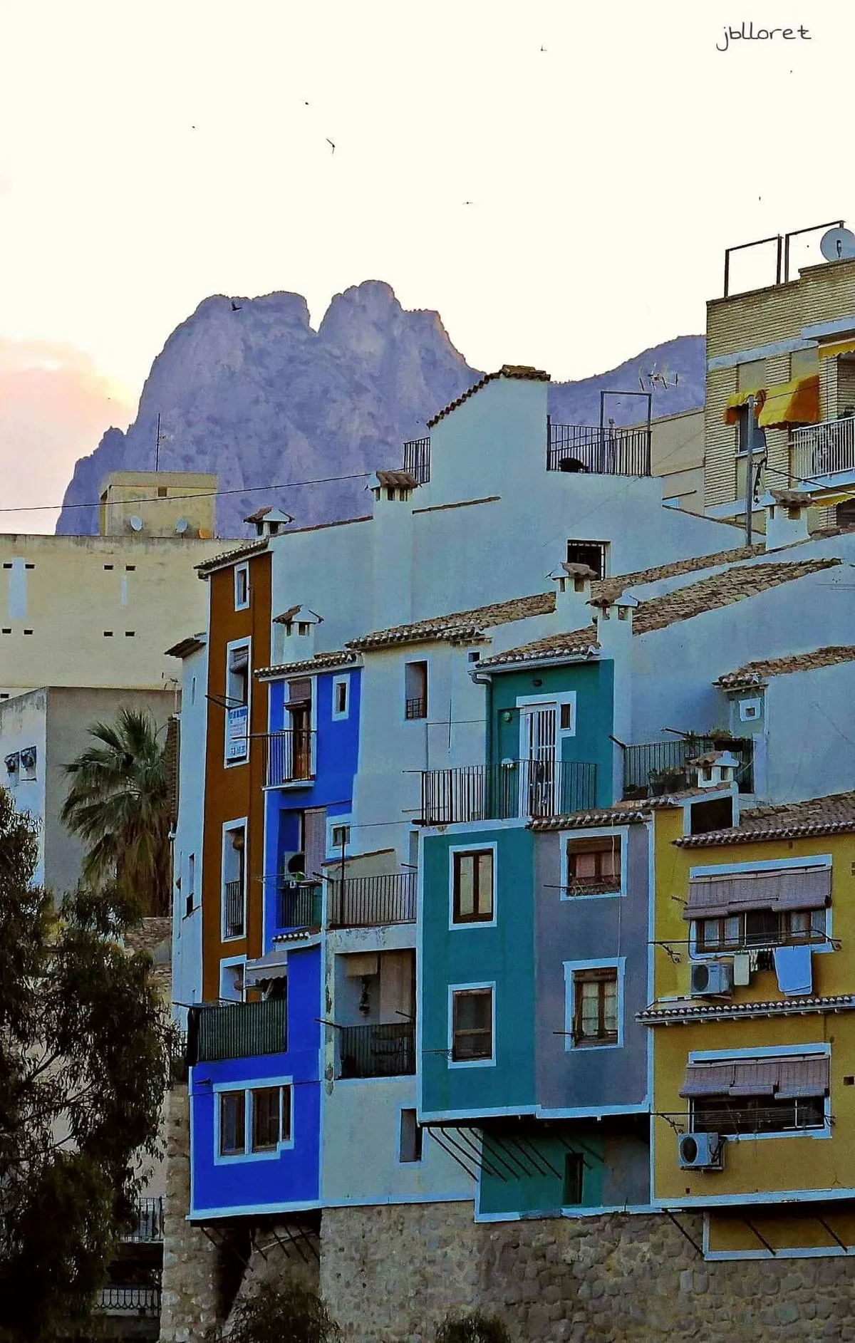 Colourful houses in Villajoyosa that demonstrate how to save on construction with local materials.