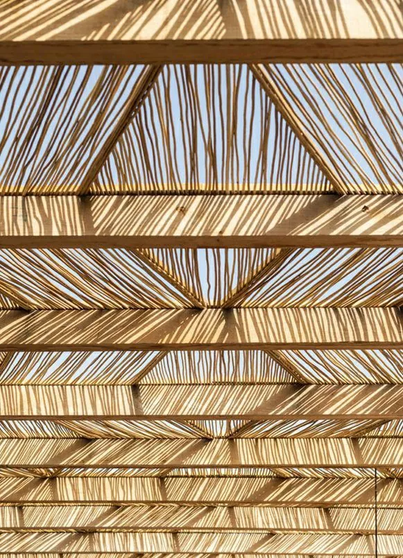 Wooden stick pergola for dual seasonal design
