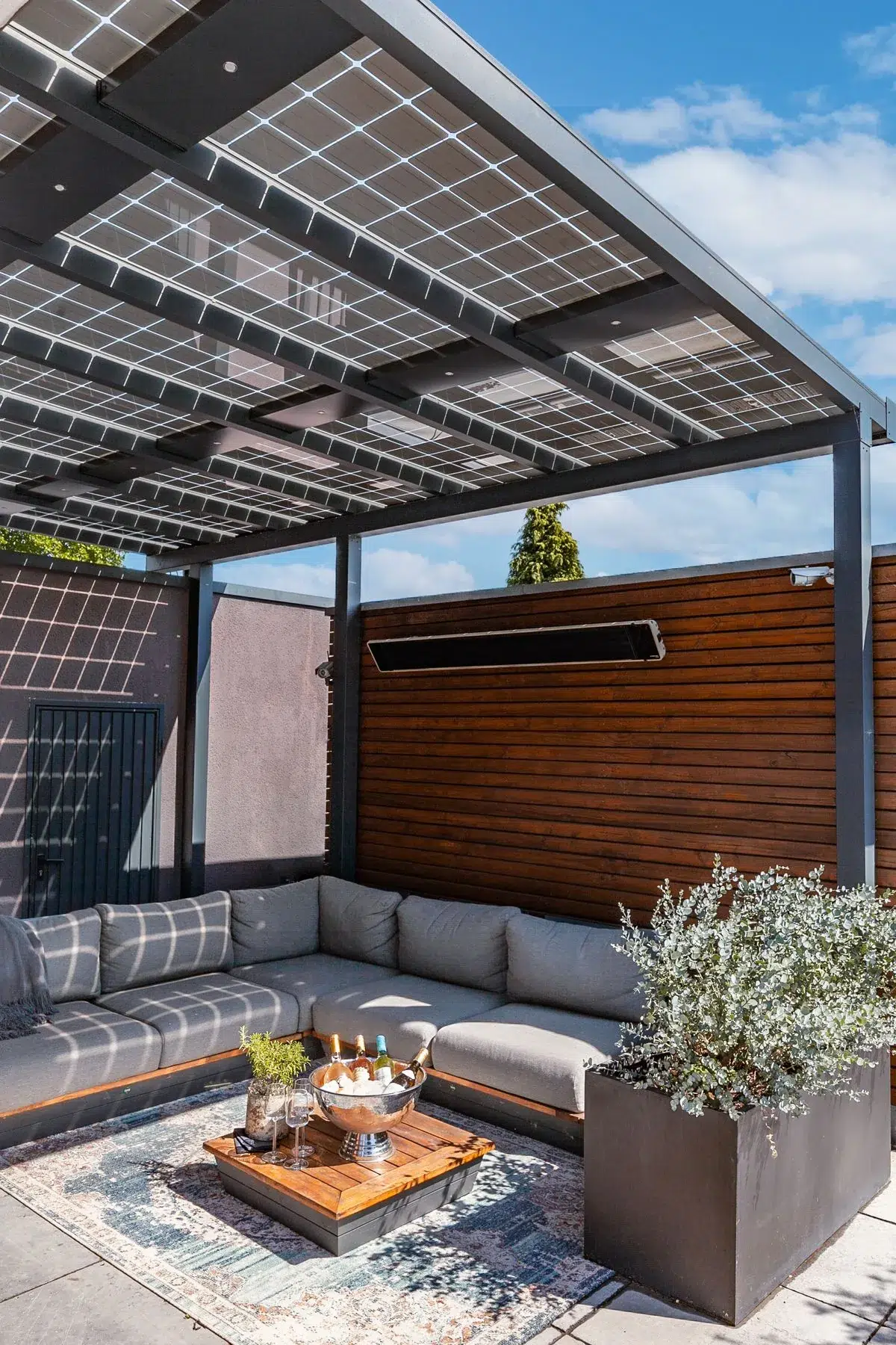 Semi-transparent solar pergola on a terrace — integration of renewable systems
